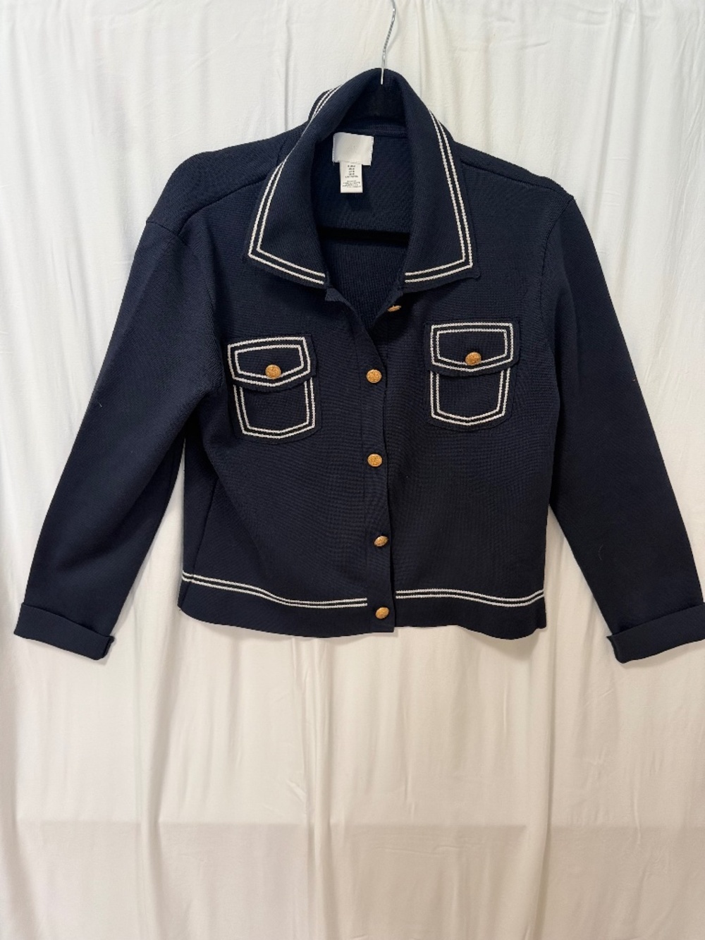 Classic navy with white accent and gold buttons jacket/cardigan.  Size M.